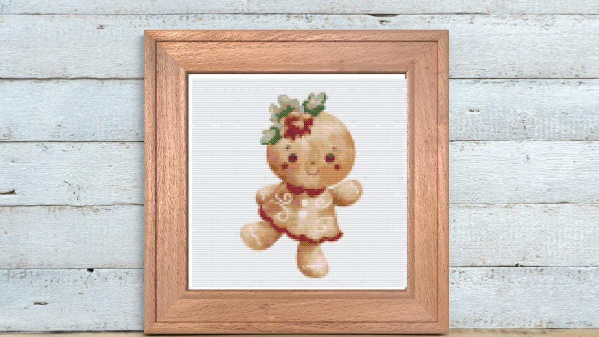 Gingerbread girl dancing cross stitch pattern