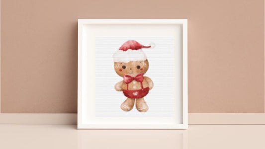 Gingerbread Man with bowtie  cross stitch pattern