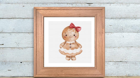 Gingerbread girl with bow cross stitch pattern